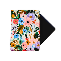Kindle Paperwhite sleeve with snap to protect Kindle e-readers made with a pastel floral print atop a white background.